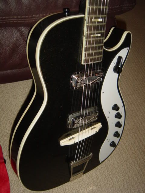 http://i197.photobucket.com/albums/aa205/guitarcapo/DSC04747.jpg