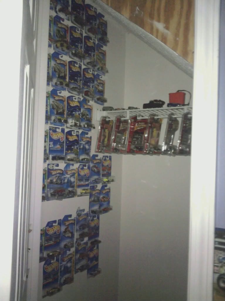 hanging hot wheels on wall