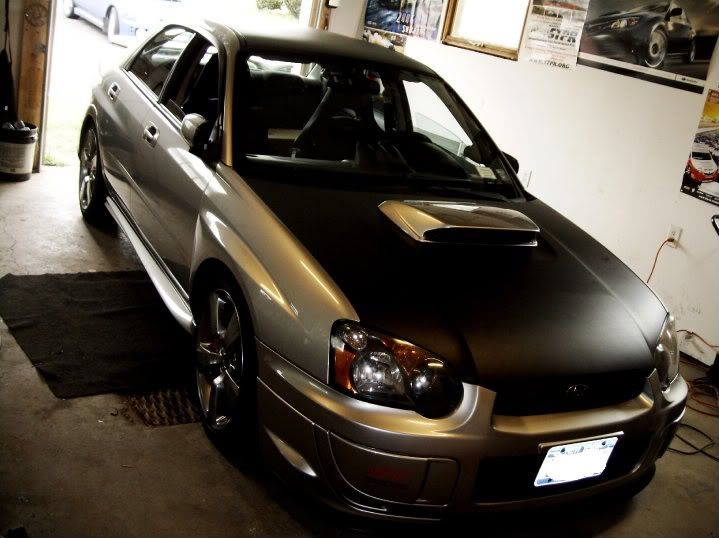 http://i197.photobucket.com/albums/aa305/fasmust/05%20STi%20progress/vinylinnicksgarage.jpg